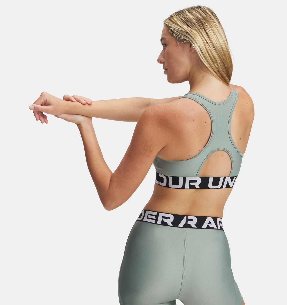 HeatGear® Armour Mid Branded Women's Sports Bra - Runner