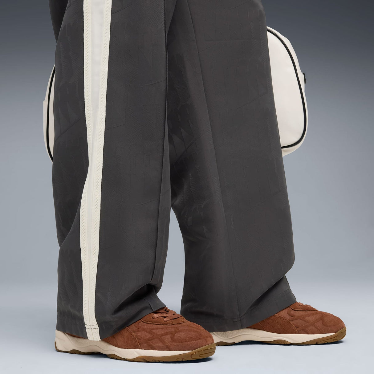 The NeverWorn VI T7 Track Pants Men - Runner