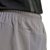 WORKOUT ESSENTIALS BASE WOVEN SHORT