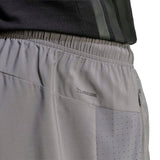 WORKOUT ESSENTIALS BASE WOVEN SHORT - Runner